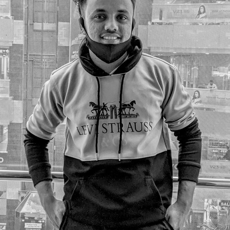 Portrait of Zephyr, group coordinator and fusion cooking expert